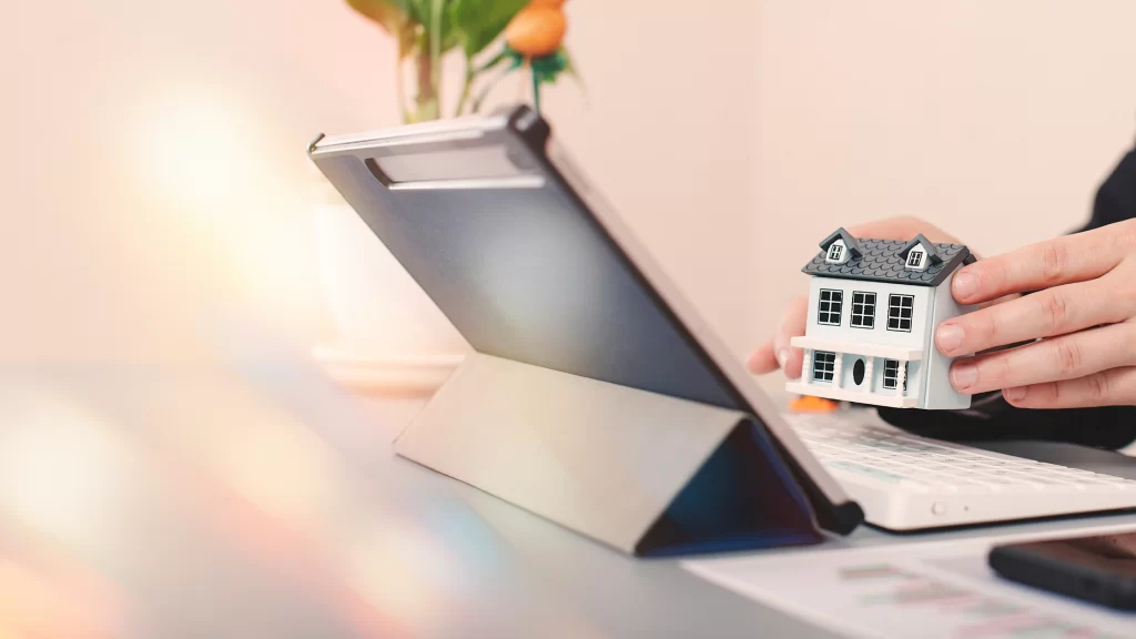 Top 10 Property Inspection Software Features for Property Professionals 1 White male using property inspection software on Ipad