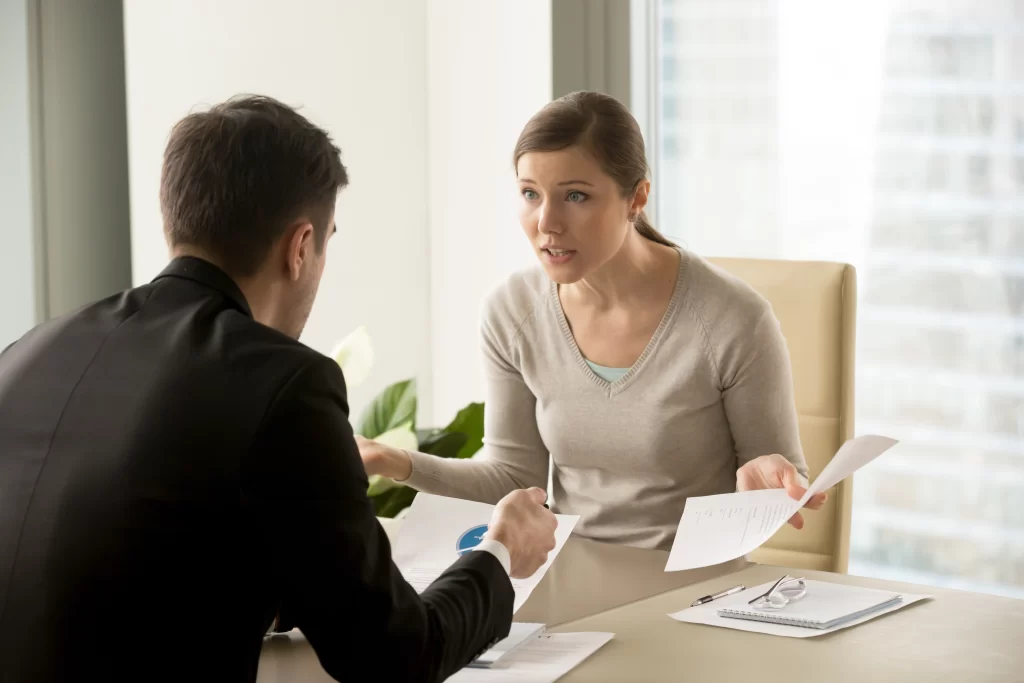 5 Tips to Deal with the Most Common HOA Complaints 1 Visual of a disagreement between two individuals, potentially linked to HOA complaints or neighborhood conflicts.
