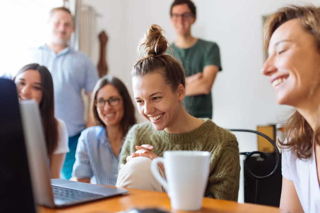 4 Ways to Convince Your HOA Board You Need Software + Common Objections 1 convince your hoa board - a group of 6 people looking at a laptop